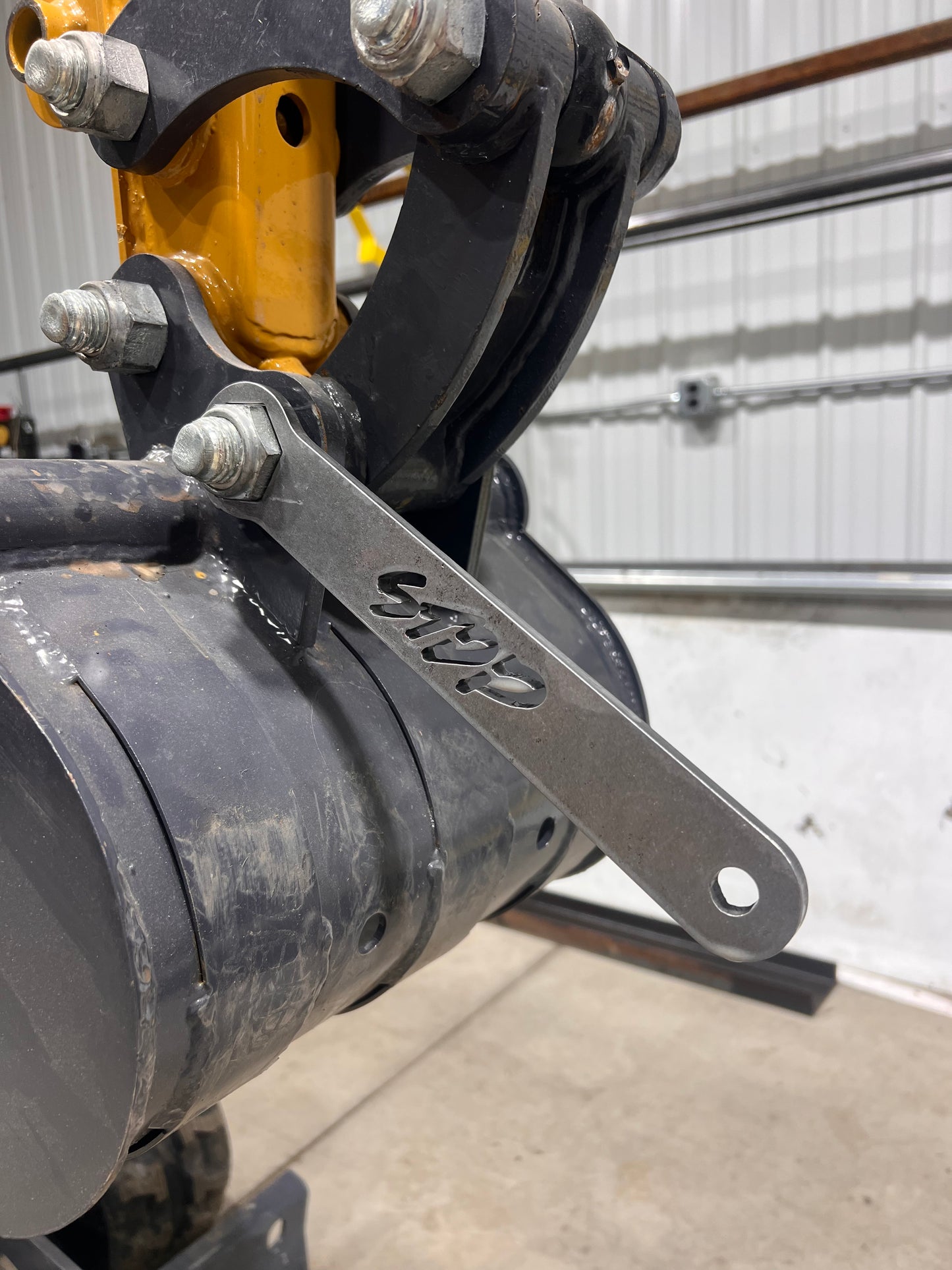 Mini excavator bucket wrench