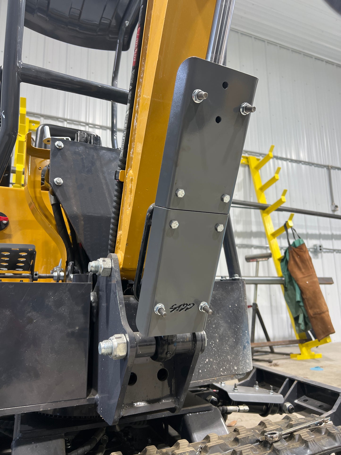 Main boom cylinder guard